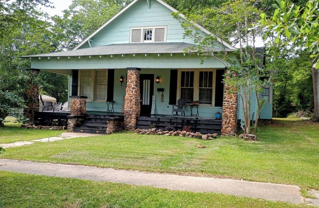 Cozy single family home overflowing with Southern charm and modern appeal.