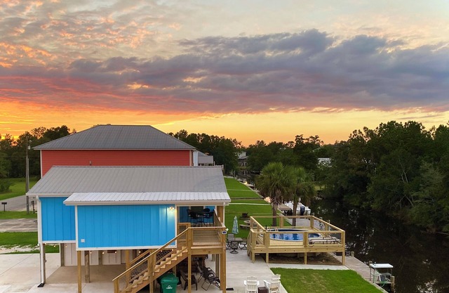 Cozy water front home with a swimming pool near beaches and Old Town BSL!
