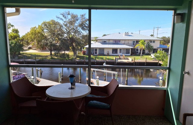 Cozy Waterfront Condo On Tudor Canal With Boat Slip Near Downtown Cape Coral.