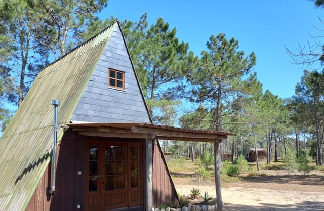Cozy wooden house near the beach in the natural park