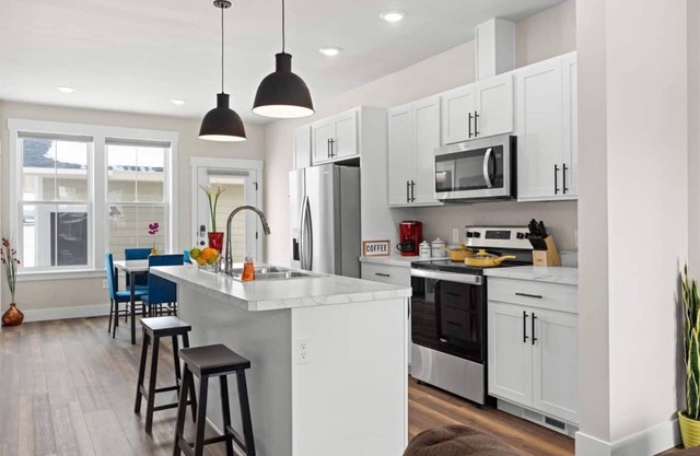 Crash with Class in this Townhome