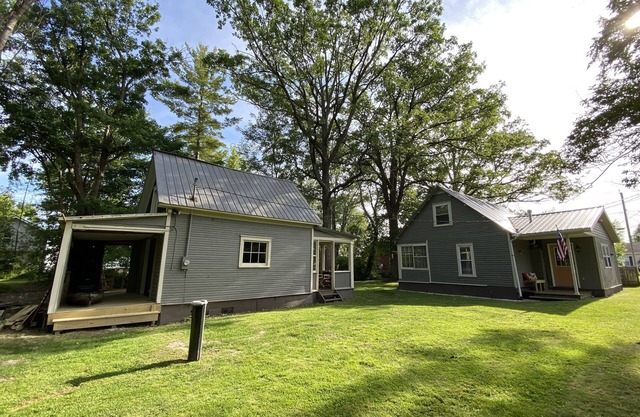 Creek Side Cottage with Lake Views, Lake Access, Dock and Secluded Yard