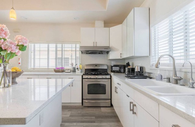 Crowning Luxury: 3 King Suites, 3 Bath Retreat, Workstations, Lightspeed Internet, and On-Site Laundry with Parking.