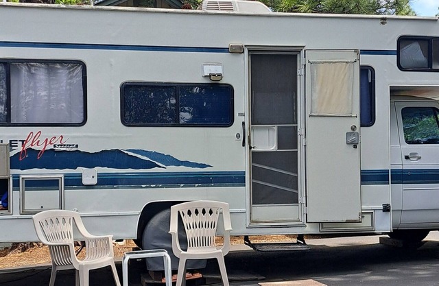 Cute RV in forested moutains near charming Sonora.