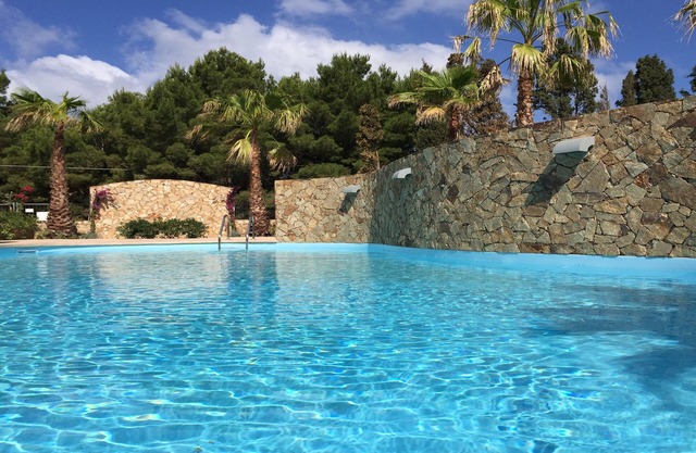 Wohnung mit Garten in Residenz mit Pool