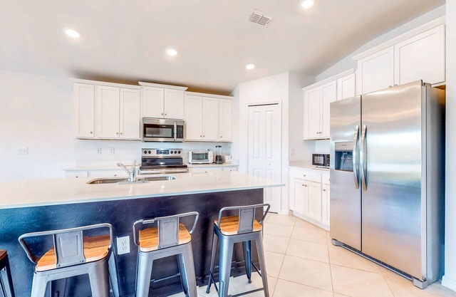 Delightful home with beach access, balcony, central AC, & W/D