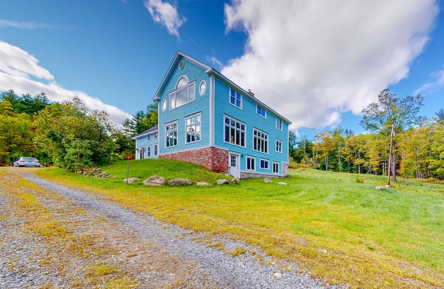 Delightful updated farmhouse with original features, patio, and & W/D