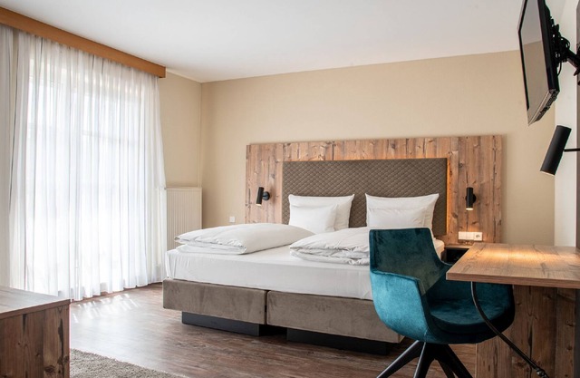 Deluxe Doppelzimmer mit Dusche und WC