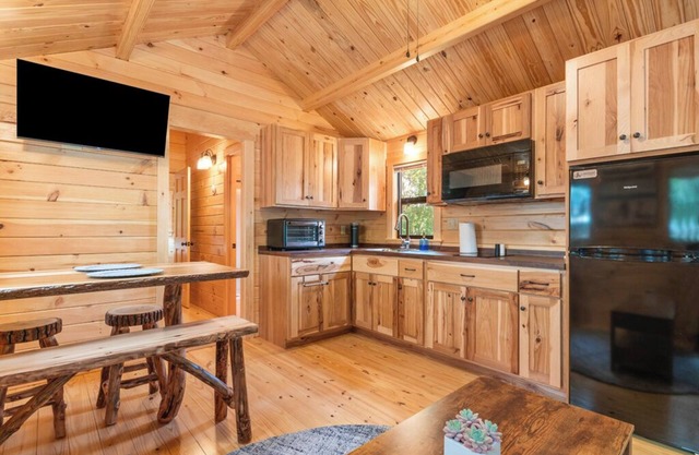 Deluxe Family Cabin with Porch View - Happy Travelers RV Resort
