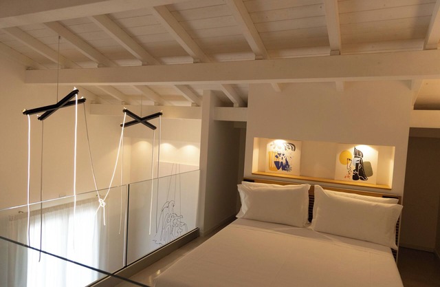 Studio Loft Vierbettzimmer Deluxe mit Terrasse