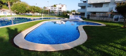 Denia Beach Apartment Jardín privado y piscina