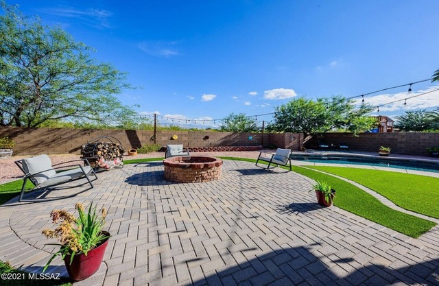 Desert home with pool, fire pit & mountain views