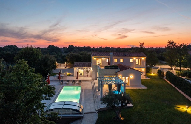 Design Villa Sole ***** mit 48m² beheiztem Pool, Spielzimmer, Fitness- & Wellnesshaus