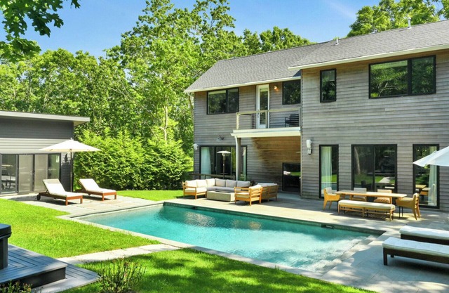 Designer Gut Renovated Farmhouse on over 1 Acre, Numerous Spacious Living...