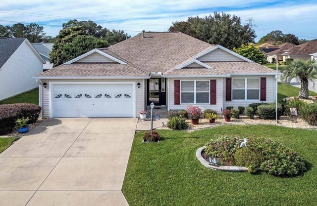 Designer home in exciting golf/retirement community.