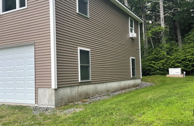 Desirable 3-bedroom apartment with AC and WiFi steps from Pristine Schoodic Lake