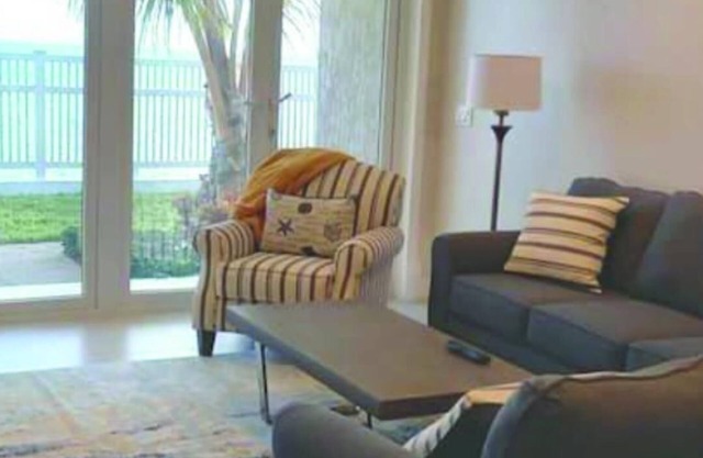 Detach & Unwind at this Beachside Condo. Literally steps away from the beach!