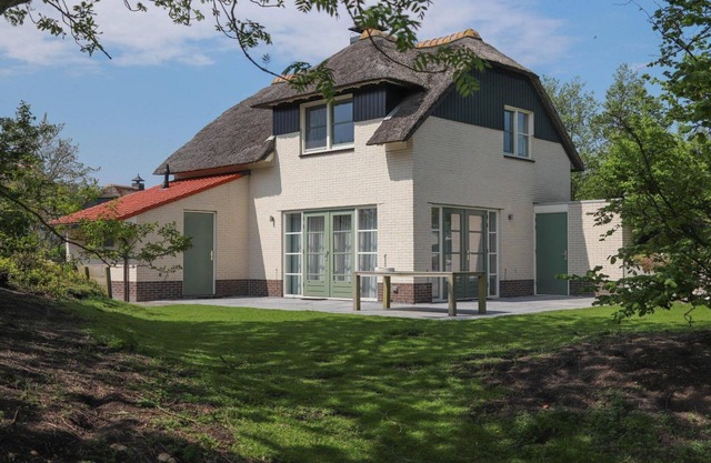Freistehende Dune Villa mit großem Garten, Badewanne und zwei Terrassen – strandnah im Beach Resort Makkum.