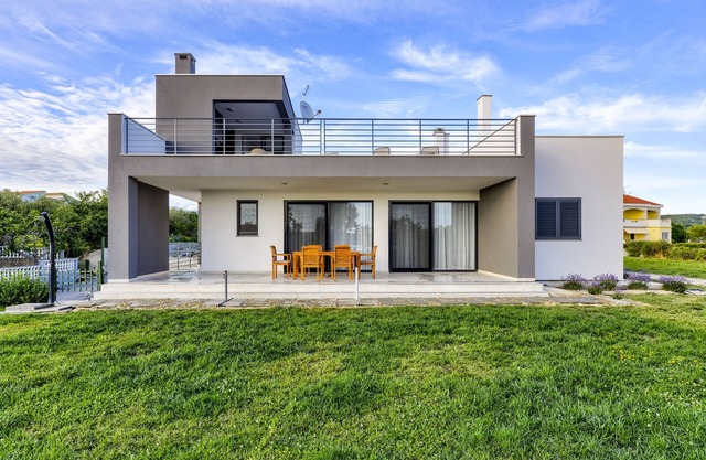Freistehendes Ferienhaus mit Meerblick und Dachterrasse mit Außenküche