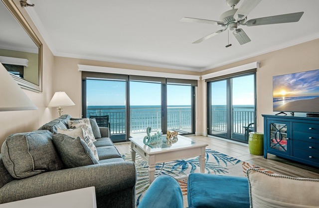 Direct oceanfront condo with a large balcony and a heated beachfront pool