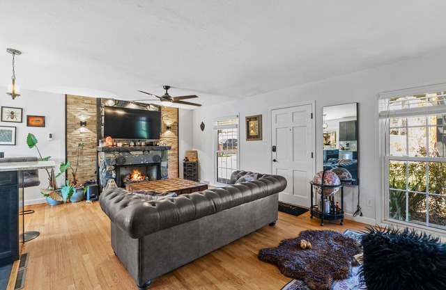 Discover Gothic Mountain Retreat Clawfoot Tub, Lush Deck, and Tranquil Coy Pond