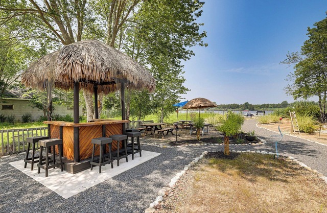 Dock + Backyard Bar: Spacious Barnegat Bay Retreat