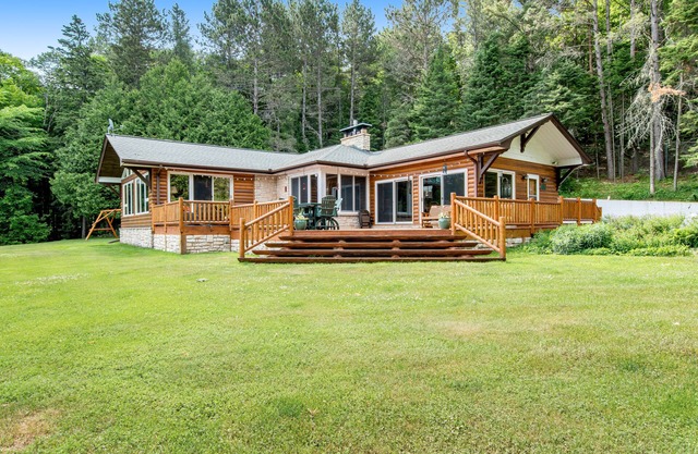 Dog-friendly and secluded lakefront gem with a full bar, private dock, and views