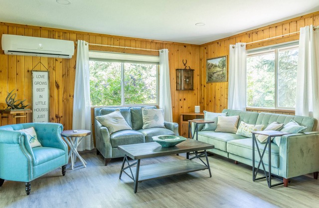Dog-friendly cabin w/ mountain/meadow views, wood stove, porch & great location