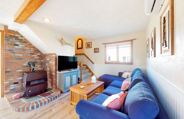 Dog-friendly coastal home steps from beach with grill, firepit, & washer/dryer