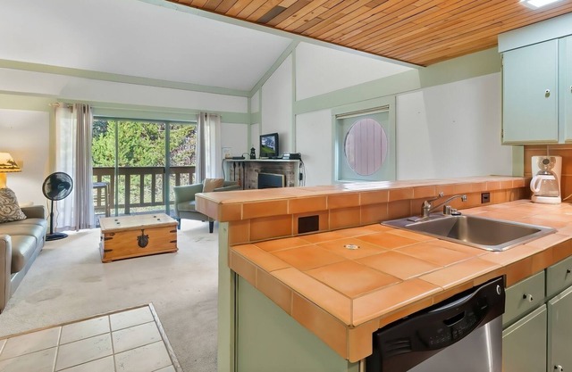 NEW LISTING! Cute Studio with private sleeping area. Light and charming! Perfect for a couple or small family. (Creekside Condo 81) by RedAwning