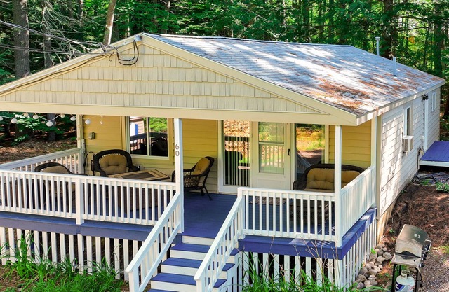 Dog-friendly cottage with lake access, EV charging, firepit, & washer/dryer