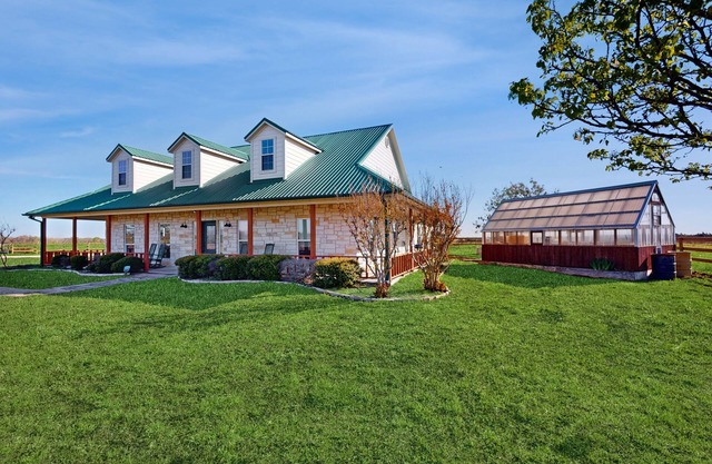 Dog-friendly countryside home with firepit, wraparound porch, & prime stargazing