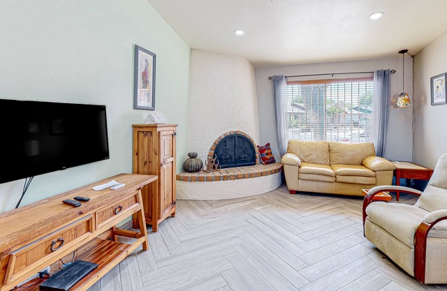 Dog-friendly desert home with an enclosed yard, patio, W/D, & AC - mtn views