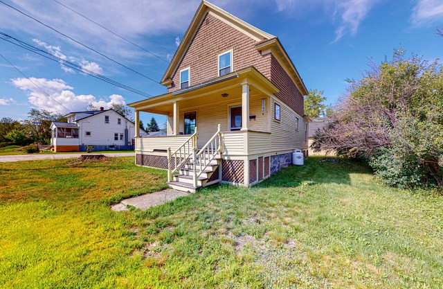 Dog-friendly getaway with porch, yard, & full kitchen - near ATV trails