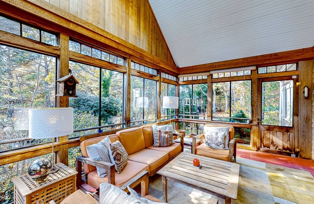 Dog-friendly, hilltop home near the beach with hot tub, firepit & gorgeous porch