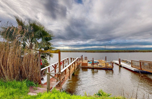 Dog-friendly home near river & marinas with firepit, grill, dock, camping ground