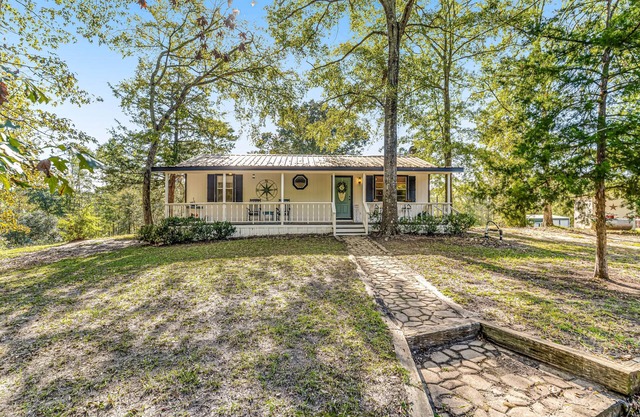 Dog-friendly home near lake with firepit, board games, patio, deck, washer/dryer