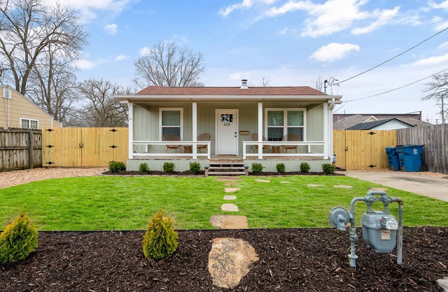Dog-friendly home with a firepit, yard, washer/dryer, central AC & game room