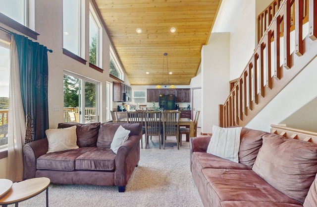 Dog-friendly home with water views, deck, grill, wood stove, & private W/D
