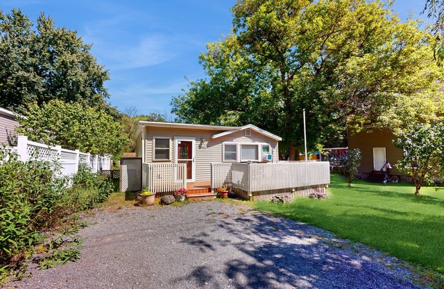 Dog-friendly home with fenced backyard & W/D - lake trails across the street