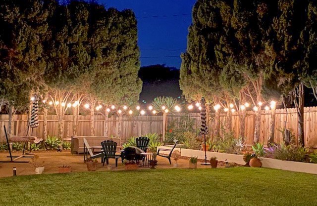 Dog-friendly house near the beach with hot tub, large backyard, firepit & grill