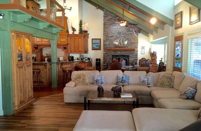 Dog-friendly, lake view home with a boat slip, three decks, fireplace & WiFi