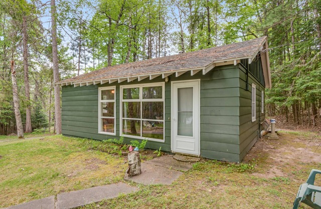 Dog-friendly lakefront cottage with lake views, firepit, dock, kitchen, & games