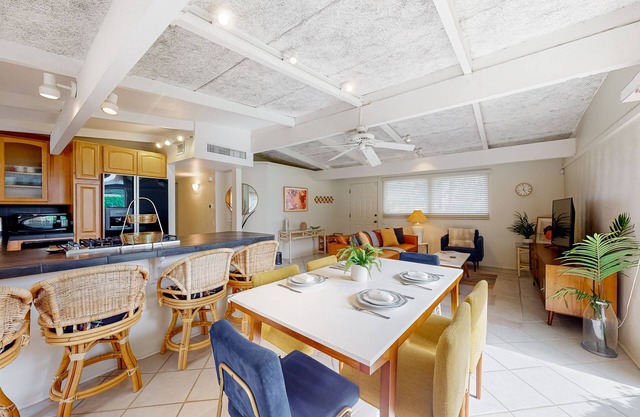 Dog-friendly mountain view condo with pool, grill, open layout, AC, & internet