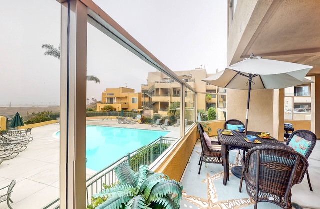 Dog friendly, ocean-view condo w/WiFi, patio, 2 pools, spa, shared grill area