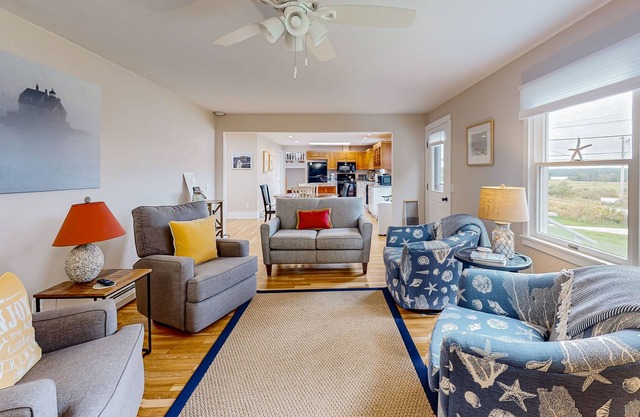Dog-friendly river view home with gas grill, patio, TV, washer/dryer, & kitchen