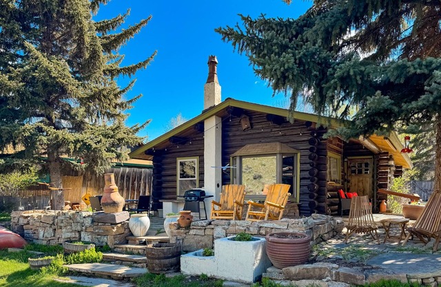 Dog-friendly waterfront cabin on Flat Creek with wood stove, creek view, firepit