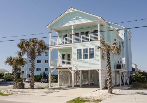 Dolphin Watch by Bryant Real Estate