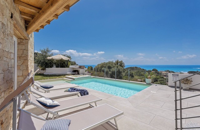 Domus Aura villa in Sardinia with sea view and pool