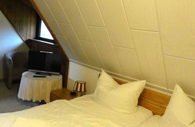 Doppelzimmer 15 m² (Gemeinschaftsbad) - Reetdachhaus Landhaus Ulrich